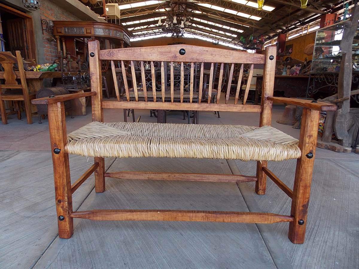 Handcrafted Wooden Room with Woven Seat.