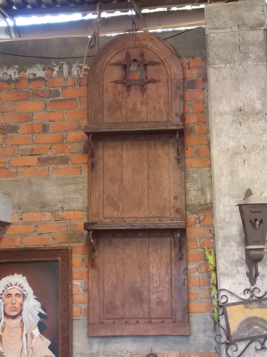 Old and original wooden door, cupboard, window, dungeon