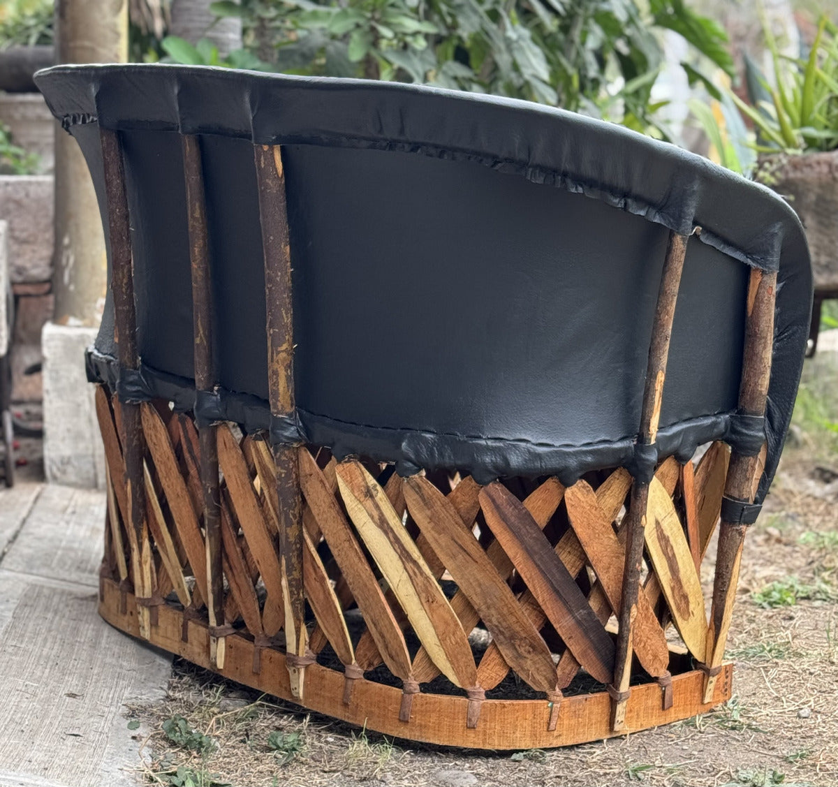 Black Handcrafted 2-Person Equipal Style Love Seat.