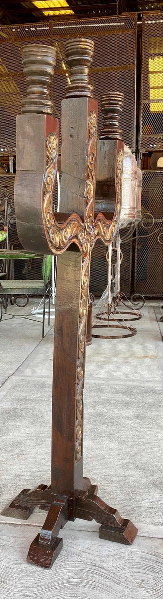 Antique and original hand-carved wooden candlestick