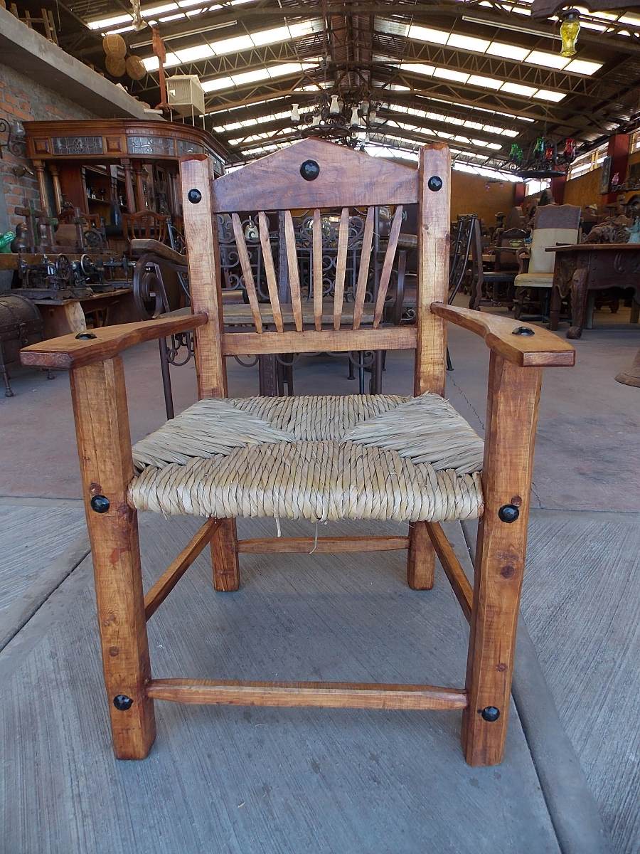 Handcrafted Wooden Room with Woven Seat.