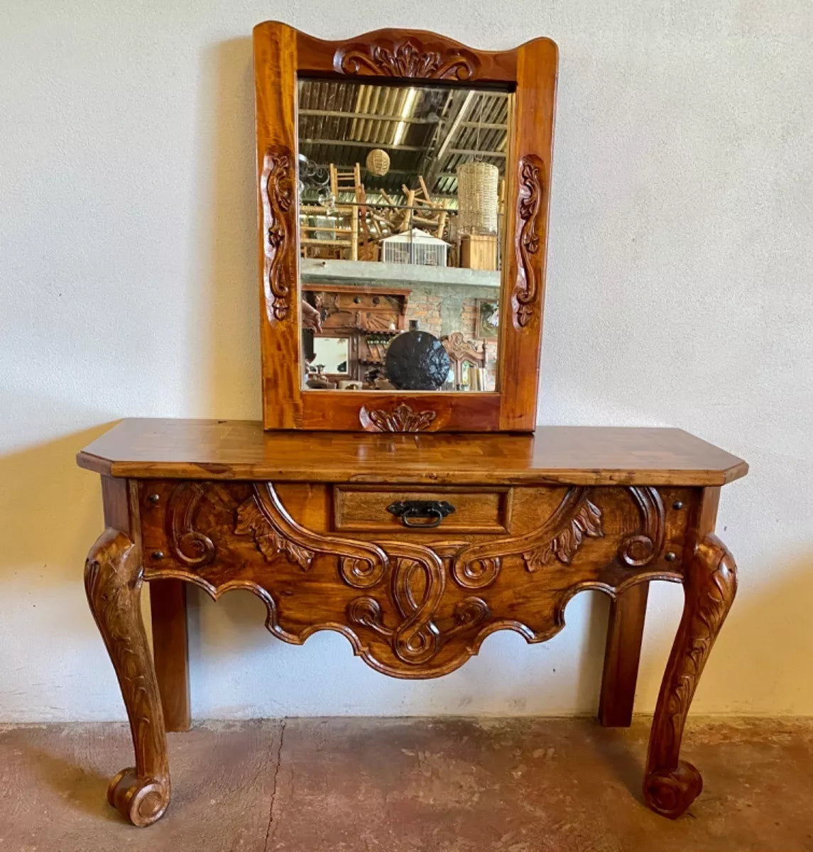 Sideboard with mirror carved in antique-style wood.