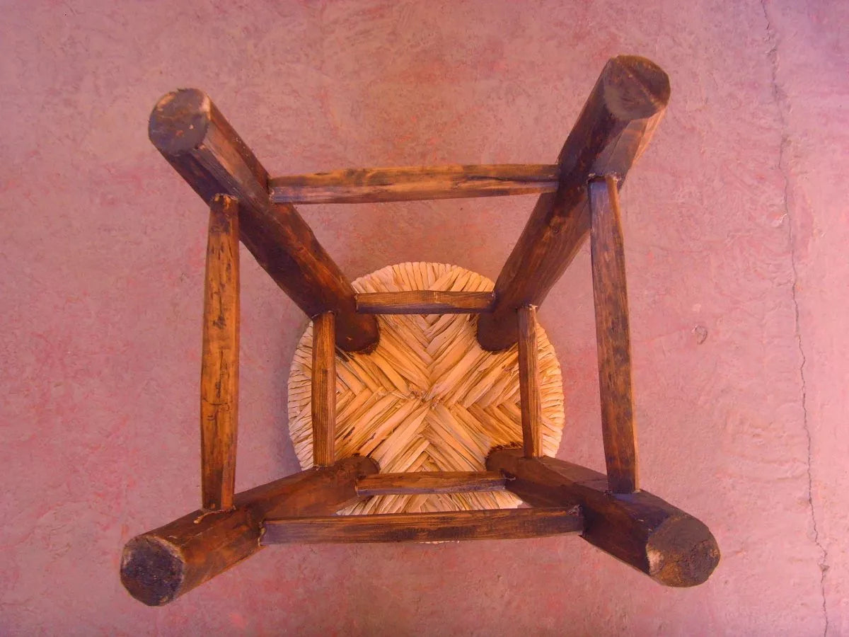 Handcrafted bar stool made of wood and tulle. Antique style.