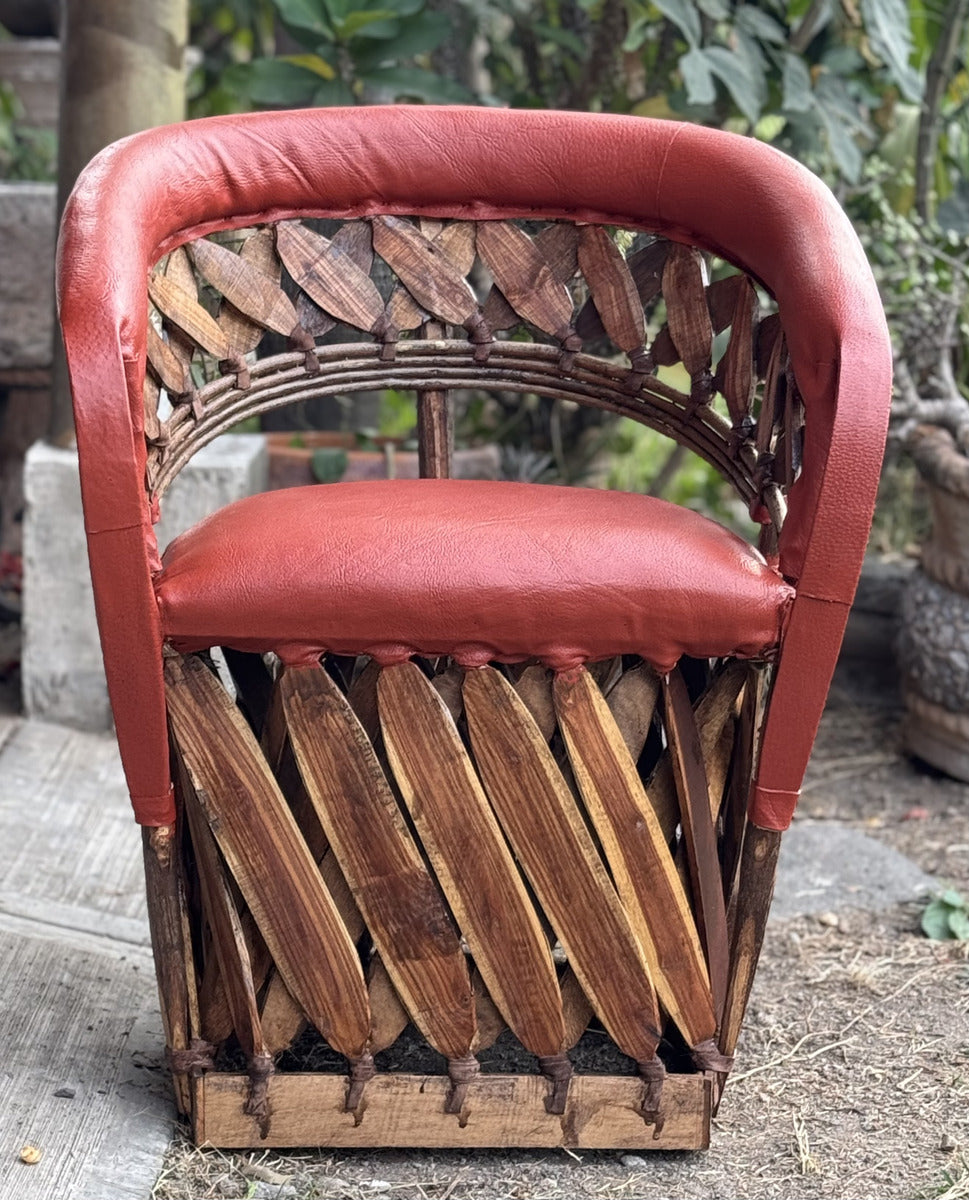 Beautiful Handcrafted Equipal Style Chair with Terracotta Stakes.