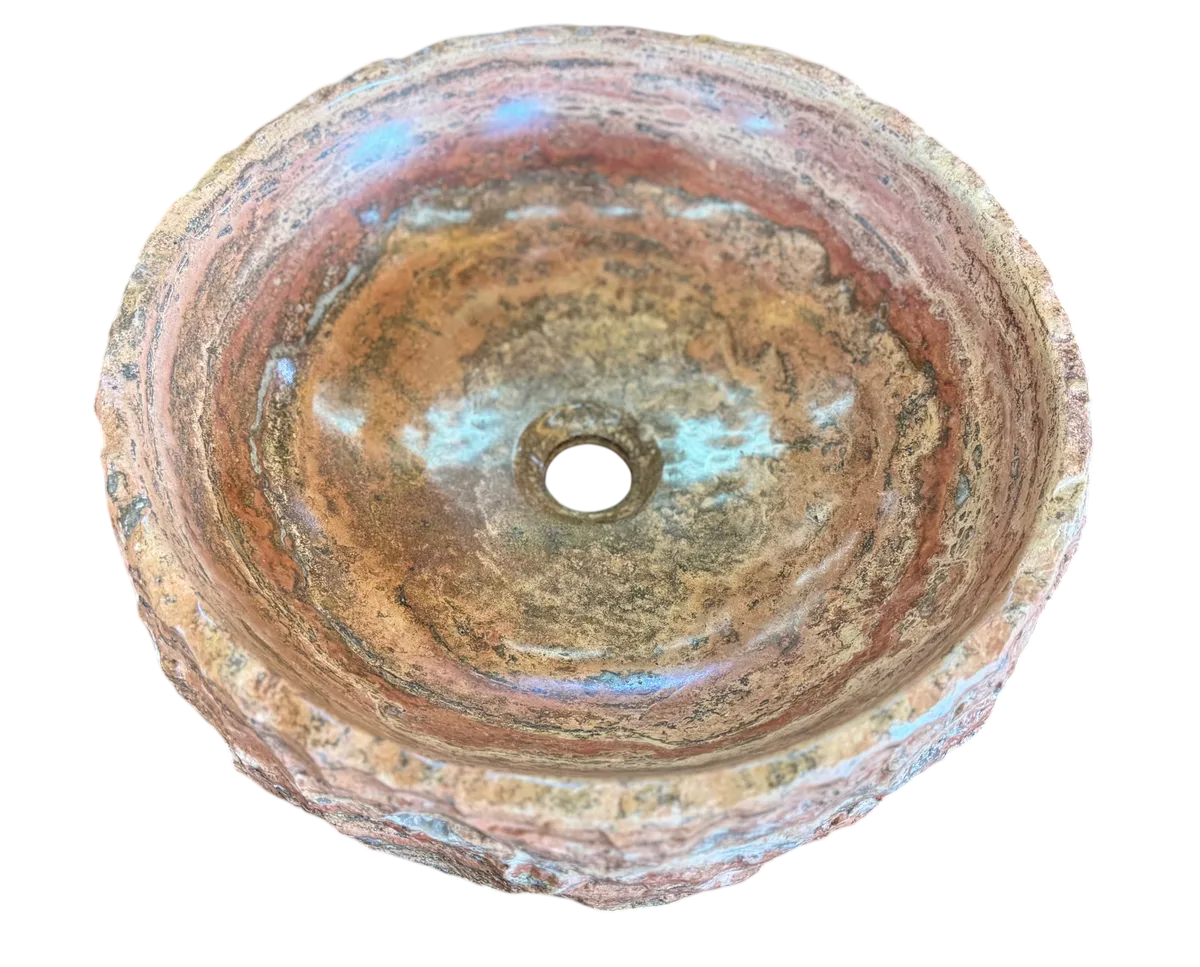 Round countertop sink in fine antique-style marble.