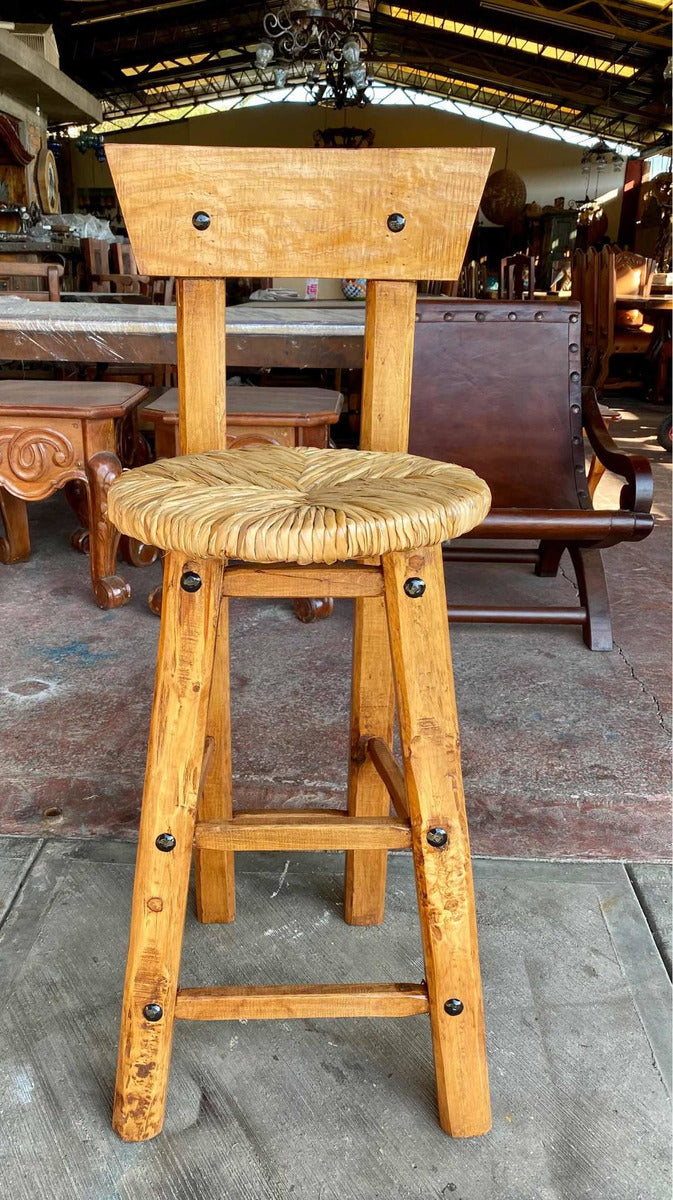 Sustainable handcrafted bench made of wood and forged metal, woven with tulle.