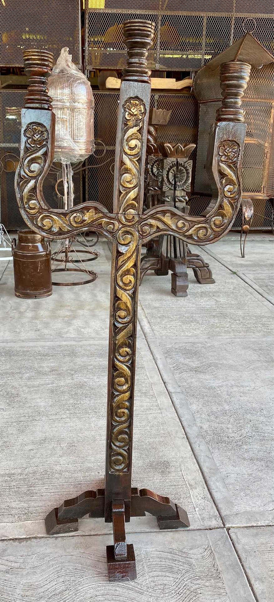 Antique and original hand-carved wooden candlestick