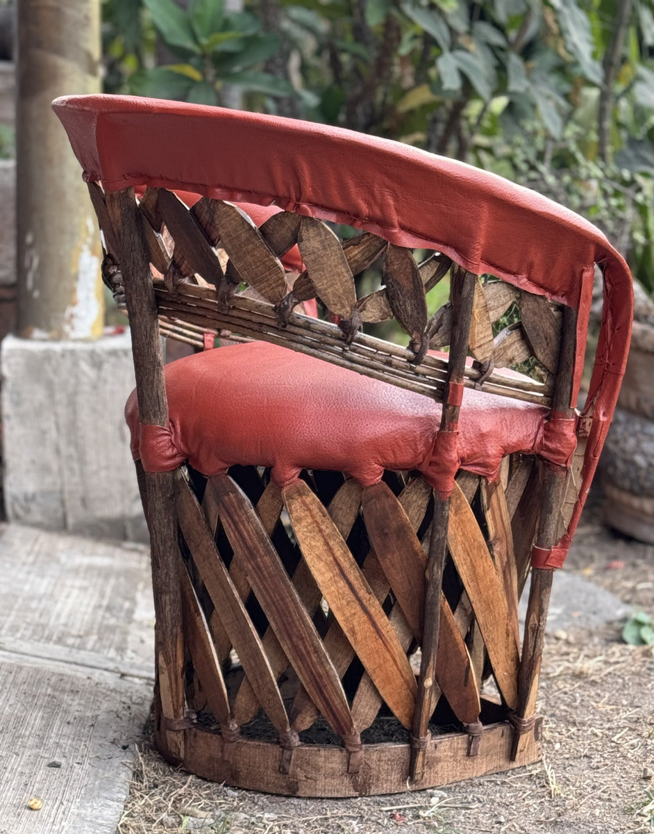Beautiful Handcrafted Equipal Style Chair with Terracotta Stakes.