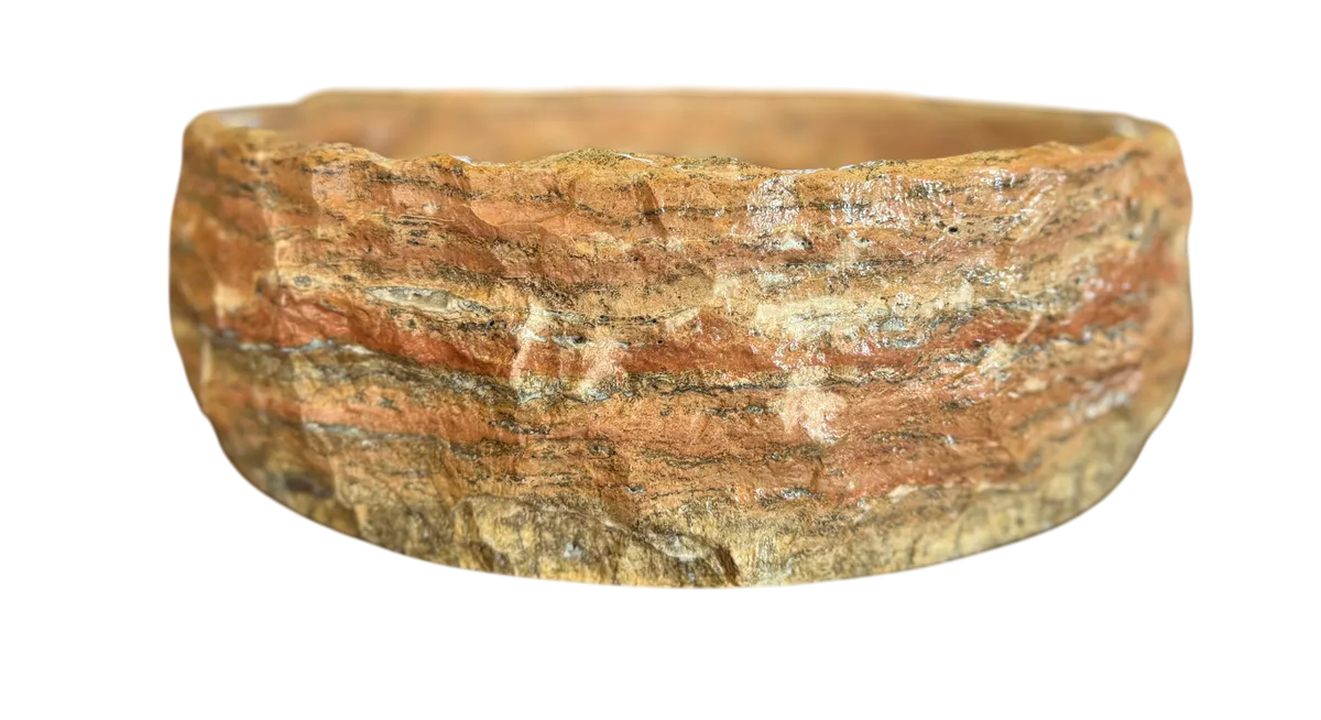 Round countertop sink in fine antique-style marble.