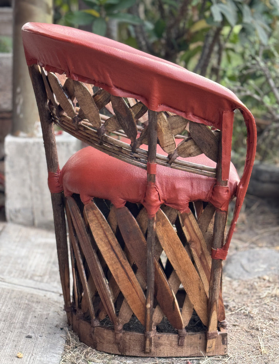 Beautiful Handcrafted Equipal Style Chair with Terracotta Stakes.