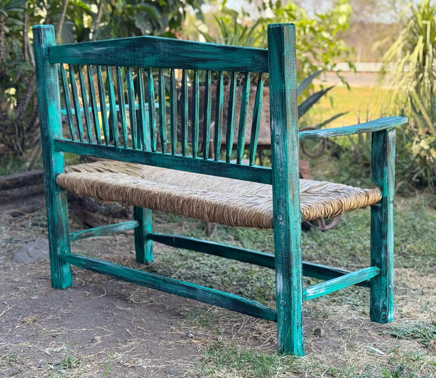 Handcrafted solid wood bench with tule woven seat