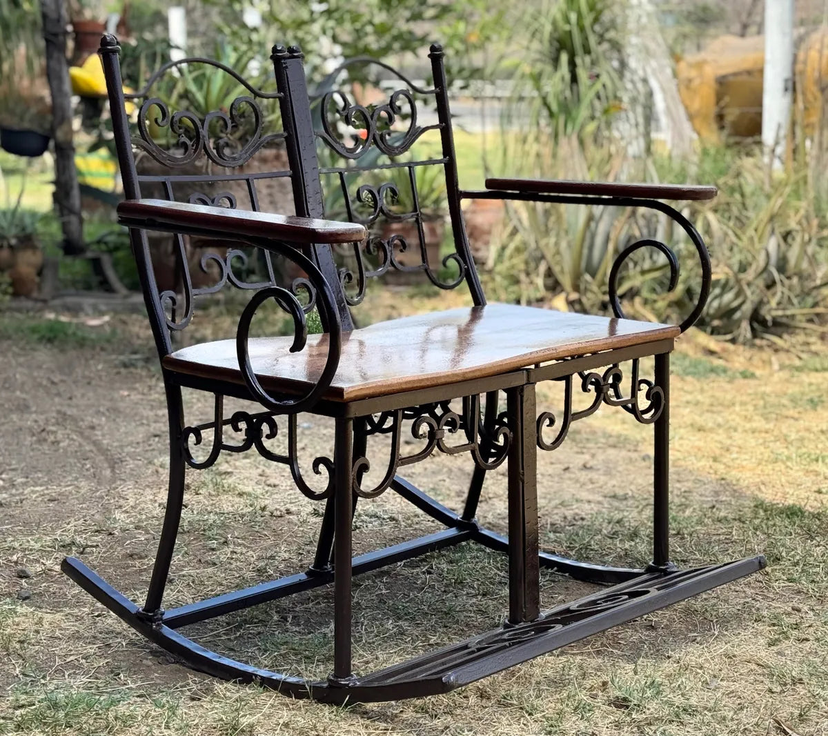 Antique Style Wrought Iron and Parota Rocking Bench