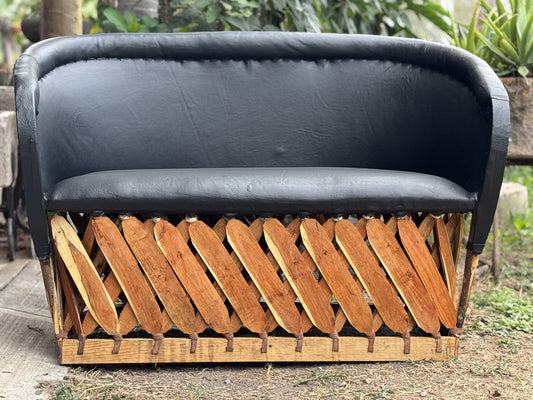 Black Handcrafted 2-Person Equipal Style Love Seat.