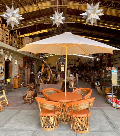 Equipales Wood and Leather Dining Room with Antique Style Umbrella