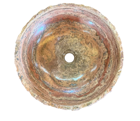 Round countertop sink in fine antique-style marble. 