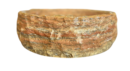 Round countertop sink in fine antique-style marble. 